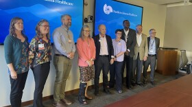 Arizona Governor Katie Hobbs poses with Northern Arizona Healthcare CEO David Cheney and NAH staff during a visit to Flagstaff Medical Center on June 12, 2025.
