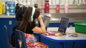 First graders work on assignments on laptops at Epic Charter Schools' Stonegate Virtual Learning Center in Oklahoma City on Feb. 28, 2023.