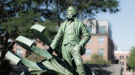The sculpture of Herman Melville is located by the Seamen's Bethel in New Bedford. Sculptor Steff Rocknak said she and Chris DeCaprio of UAP chose the greenish-gray patina for the outside of the statue to make it look like it was just pulled from the sea.