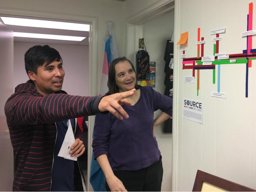 Nick Vargas talks with Dr. Kathryn Hall at The Source, an LGBT center in Visalia, Calif. Hall says that time and time again, her patients tell her they're afraid to come out to their other doctors.