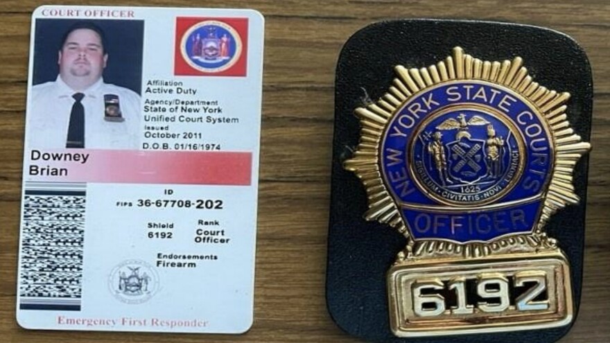 Downey's name and photo appear on what authorities say is a fake New York Court Officer badge.