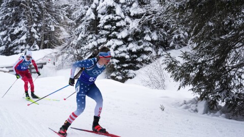FILE - Campbell Wright, of the United States, right, competes in the men's 4x7.5-kilometer relay biathlon race at the 2026 Winter Olympics in Anterselva, Italy, Feb. 17, 2026.