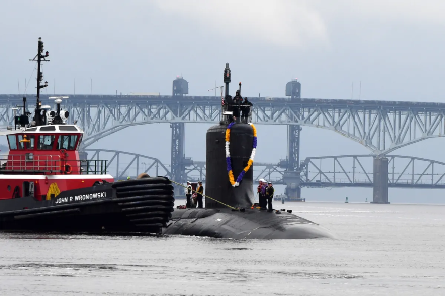 The Virginia-class submarine USS Minnesota (SSN 783) heads up the Thames River toward Naval Submarine Base New London in Groton.