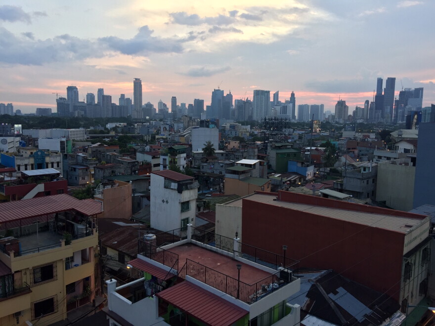 Ruben stayed in the Manila neighborhood of Makati as he awaited a flight back to the U.S. Downtown Manila is off in the distance. 