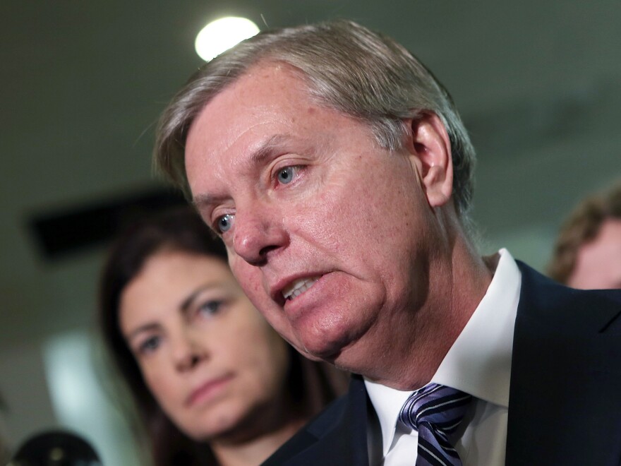 Sen. Lindsey Graham, R-S.C., and Sen. Kelly Ayotte, R-N.H., speaking to reporters after their meeting with U.N. Ambassador  Susan Rice.