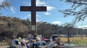 Stuffed animals and flowers surround a memorial outside Camp Mystic, along the Guadalupe River near Kerrville, Texas, honoring the nearly 30 children who were killed when floodwaters tore through the area on July 4.