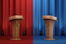 illustration showing two podiums with microphones facing each other, the one on the left is on a red stage with red curtains, on the right is a blue state and blue curtains 