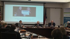 File photo of State Board of Education Chairman Bill Cobey (center-right) listening while State Superintendent Mark Johnson gives a monthly address to the board.