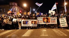 Protesters march through Logan Square neighborhood during a rally in Chicago, Illinois. The rally was held to protest the killing of 13-year-old Adam Toledo by a Chicago Police officer on March 29th. The video of the fatal shooting was released on Thursday to the general public by the Civilian Office of Police Accountability more than two weeks after the incident took place. 