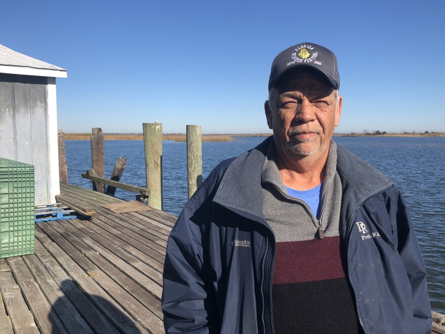 Joseph "Smokey" Parrish has worked at 13 Mile Seafood for 37 years. He oversees the wholesale shrimp operation and is also a Franklin County commissioner. He says nearly 5,000 jobs are at stake if the fisheries here collapse.