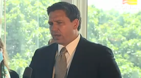 Florida Governor Ron DeSantis speaks at a podium
