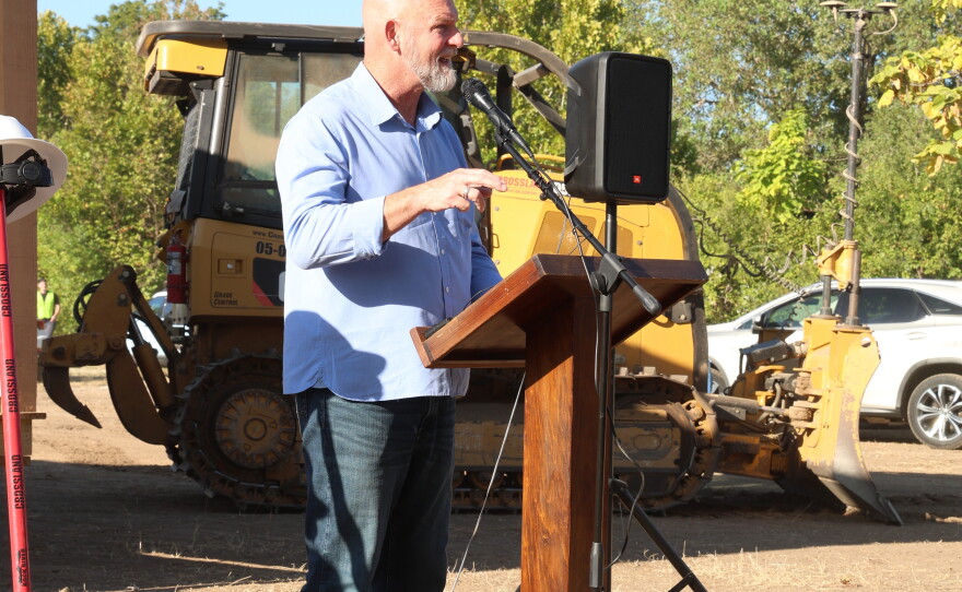 Watered Gardens Ministries CEO James Whitford speaks at the groundbreaking for Freedom Village on September 4.