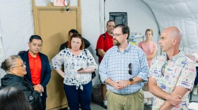Helmsley Charitable Trust Trustee Walter Panzirer, Rural Healthcare Program Director Wayne Booze and Program Officer Elizabeth Ruen listen as Northern Marianas College Nursing Department Chair Rosa Aldan explains lab equipment during a recent site visit.