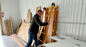 Rancher Lamont Herman collects building materials in a nearby storage unit to build his meat-cutting room at Montana Prime Meats