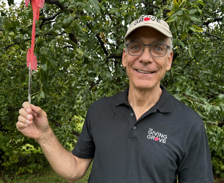 Giving Grove co-founder Kevin Birzer in the Giving Grove orchard on the grounds of the Kauffman Foundation in Kansas City.