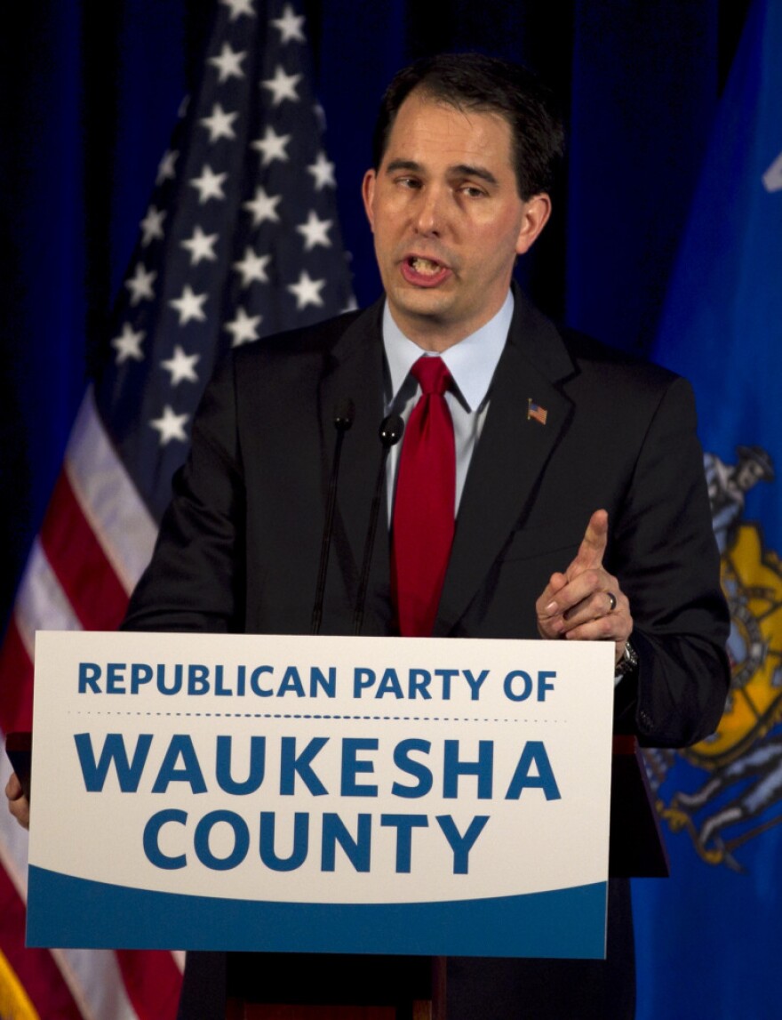 Wisconsin Gov. Scott Walker speaks to the Waukesha County Republican dinner in Pewaukee, Wis., on Saturday.