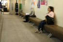 Nikki Sanchez (right), a psychology major in her first semester at Modesto Jr. College waits outside the Extended Opportunity Programs & Services office in the student services building on Sept. 24, 2025.