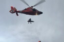 A Coast Guard MH-65 Dolphin helicopter crew hoists an injured hiker off of North Sister on Sept. 5, 2026.