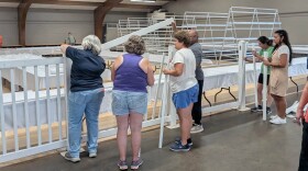 Volunteers prepare exhibit space at the Vanderburgh 4-H Center for the County Fair, July 20-25, 2026