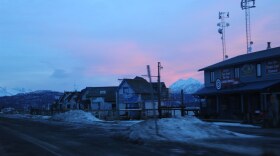 Some buildings sillheoutted by a sunset
