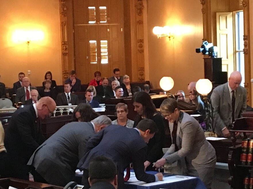 photo of electors signing in