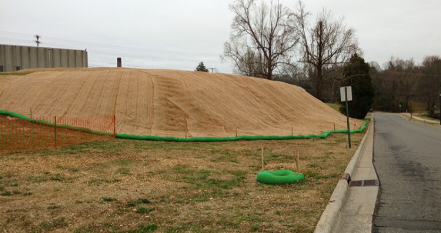 February 2017: Workers installed a new temporary cap on the mound of asbestos that neighbors call Asbestos Hill, or Mystery Hill.