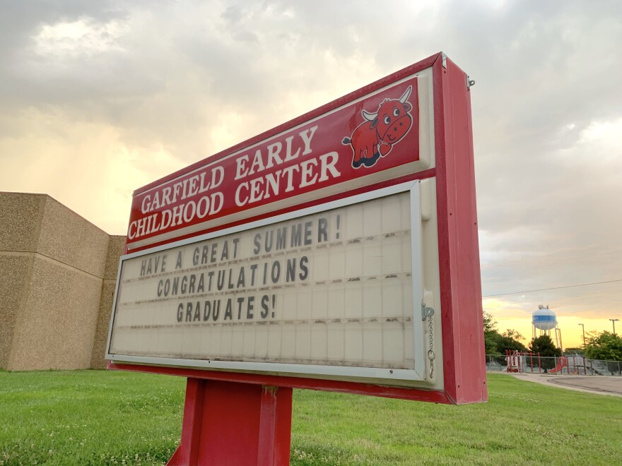 The sign outside a public school building in Garden City.