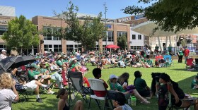 Soccer fans gather at Naftzger Park in downtown Wichita for the Global Fan Zone watch party.
