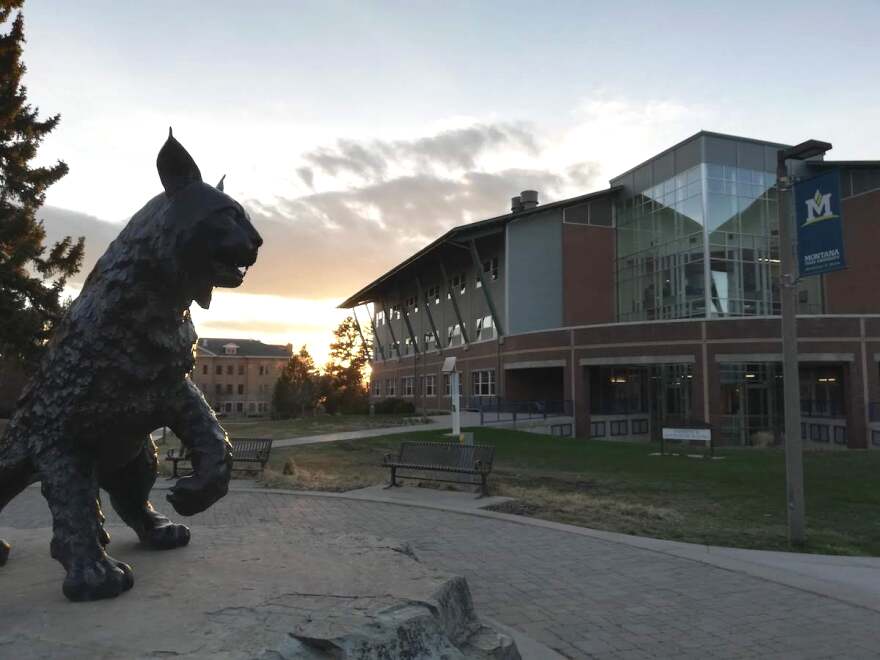 The sun sets behind Montana State University's sculpture of Spirit, the school's mascot, April 2019.