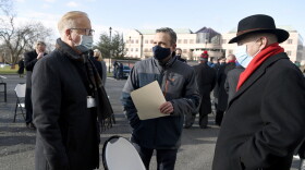 Mark Boughton, commissioner of the Department of Revenue Services, left, talks Democratic Senate Majority Leader Bob Duff, D-Norwalk, center, and Senate President Pro Tempore Martin Looney, D-New Haven, right, outside on the State Capitol grounds, Wednesday, Jan. 6, 2021, in Hartford, Conn.
