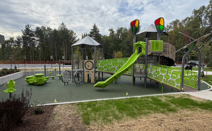 Amenities include three basketball courts, a one-mile indoor walking track, snack bar, fitness center, multi-sport simulator, playground, rentable event space, and child watch center.