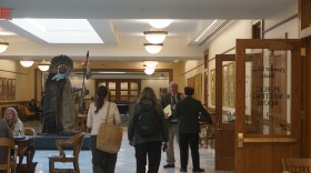 members of the public walking through the Capitol Extension 