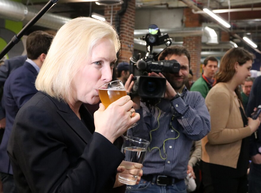 Sen. Kirsten Gillibrand sips a "Kirstenweizen," named for her by To Share Brewing Company in Manchester.