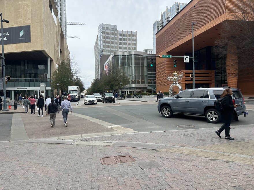 People walking in uptown Charlotte.