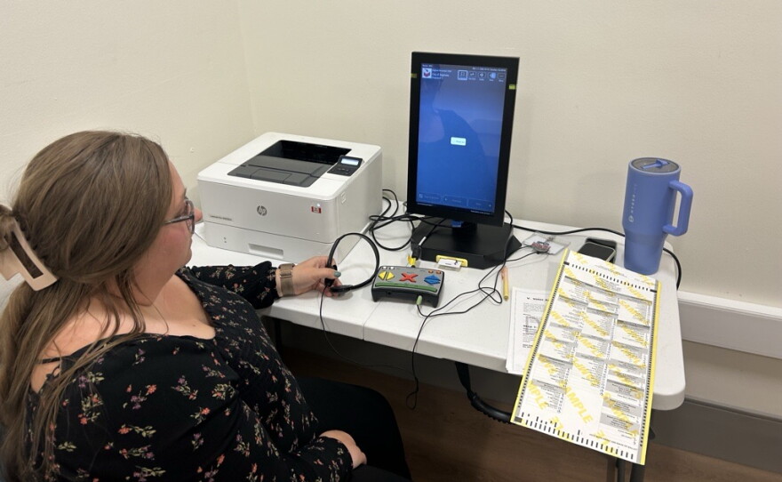 Saginaw's Deputy Clerk Breanna Croutch is testing the voter assist terminal, or VAT, during the city's Tuesday, Oct. 13, 2026, public accuracy test. The VAT helps voters with disabilities cast their ballot.