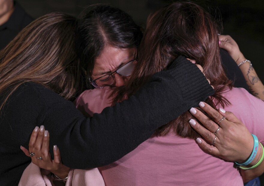 Mothers of Robb Elementary School shooting victims, from left, Sandra Torres, Veronica Luevanos, and Felicha Martinez cry together outside the Nueces County Courthouse on Wednesday, Jan. 21, 2026, in Corpus Christi, Texas, after former Uvalde school district police officer Adrian Gonzales was found not guilty. (Sam Owens/The San Antonio Express-News via AP, Pool)
