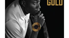 Cover of the inaugural issue of "Grandstand" magazine featuring Grant Holloway.