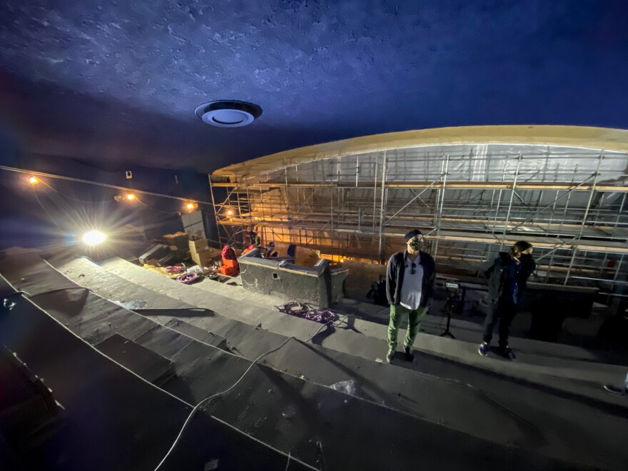 Owners of the Texas Theatre walk through the new upstairs screening room, which is under renovation and is expected to open during the summer of 2021.