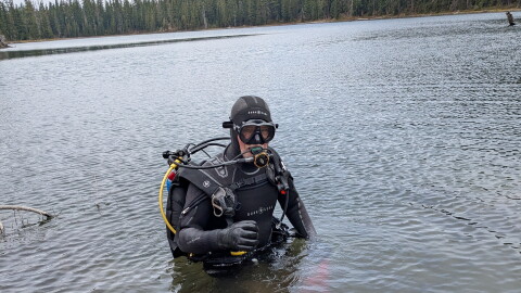 John Fischer and a friend recently hauled 100 pounds of scuba gear on a bike trailer up to what is the headwaters of the Willamette River for 10 months each year to look for a fishing pole yanked out of his 12-year-old daughter's hand by a big fish 30 years ago.