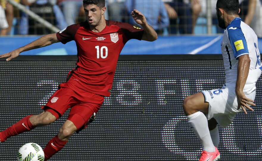 In this Sept. 5, 2017, file photo, United States' Christian Pulisic controls the ball during a 2018 World Cup qualifying soccer match against Honduras in San Pedro Sula, Honduras.