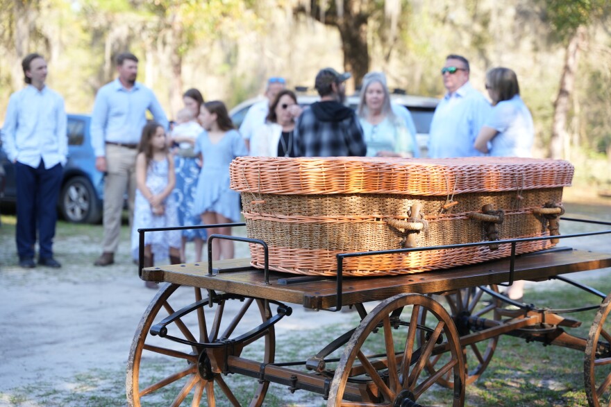 Prairie Creek Conservation Cemetery operations coordinator Kevin Moran addresses attendees of the morning service. “This is a fairly participatory process, or at least it can be,” Moran said. (Alexis Vivanco/WUFT News)
