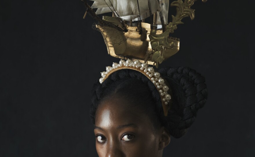 <em>Vessel. </em>This headdress was inspired by the children's book "The Lady With A Ship on Her Head," says Kudita. The ship, she says, is a reminder of the transport of slaves but also can provide passage to a future free of oppression.