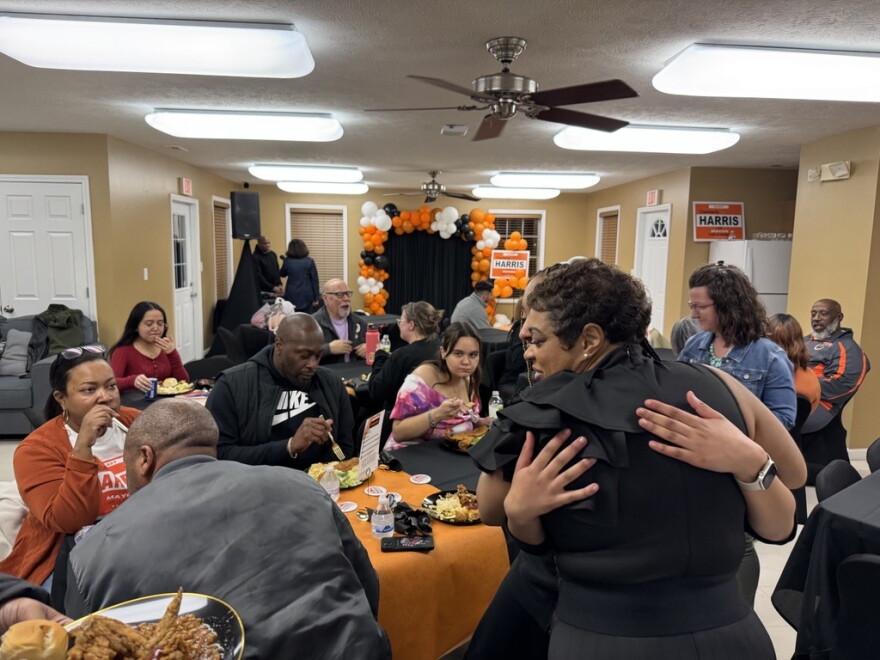 Normal mayoral candidate Chemberly Harris, right, hugs a supporter at the Savannah Green clubhouse on Tuesday, April 1, 2025.
