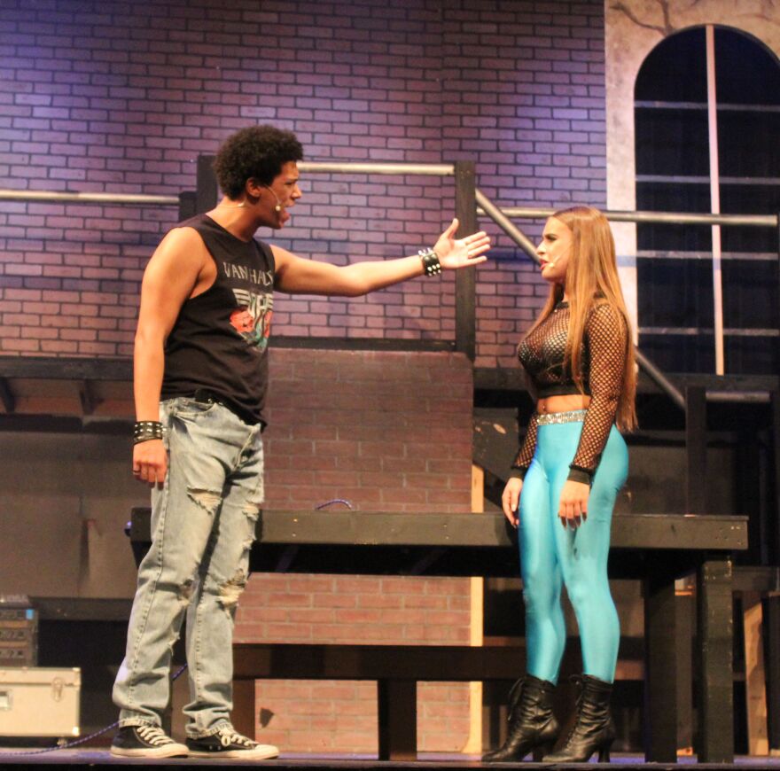 Mimi (Jay Encalada) being rejected by Roger in scene from 'Rent.'