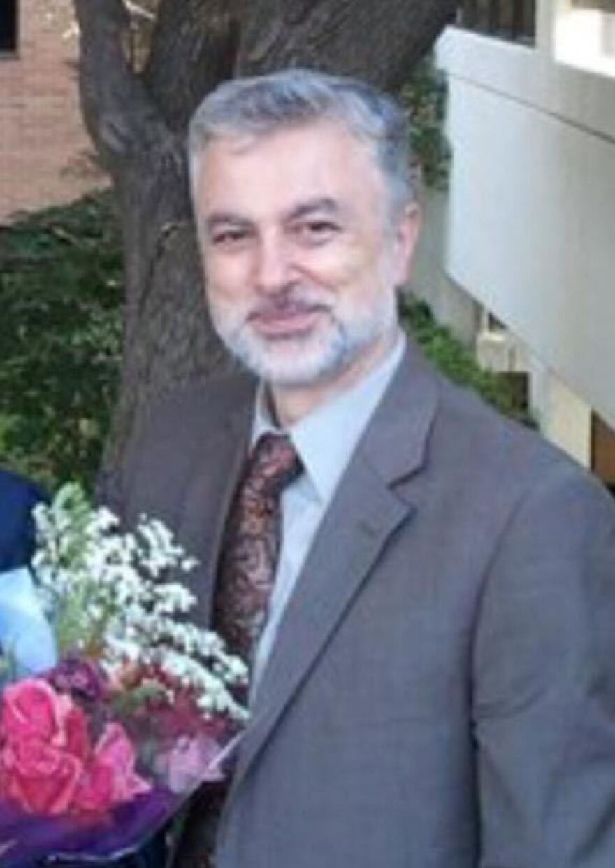 Majd Kamalmaz is photographed at his daughter's graduation from the University of Texas at Arlington in 2011.