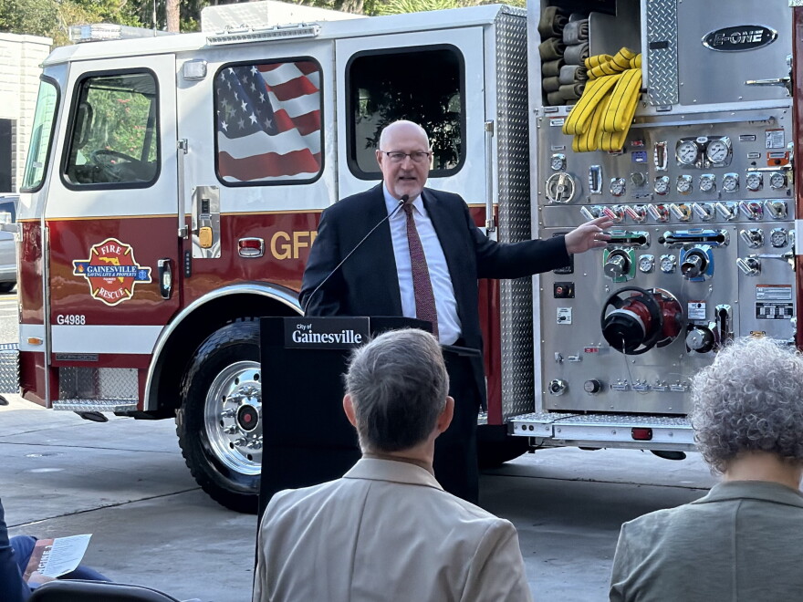 Gainesville Mayor Harvey Ward speaks during the unveiling of Gainesville Fire Rescue’s new Engine 1. (Genesis Trujillo/WUFT News)