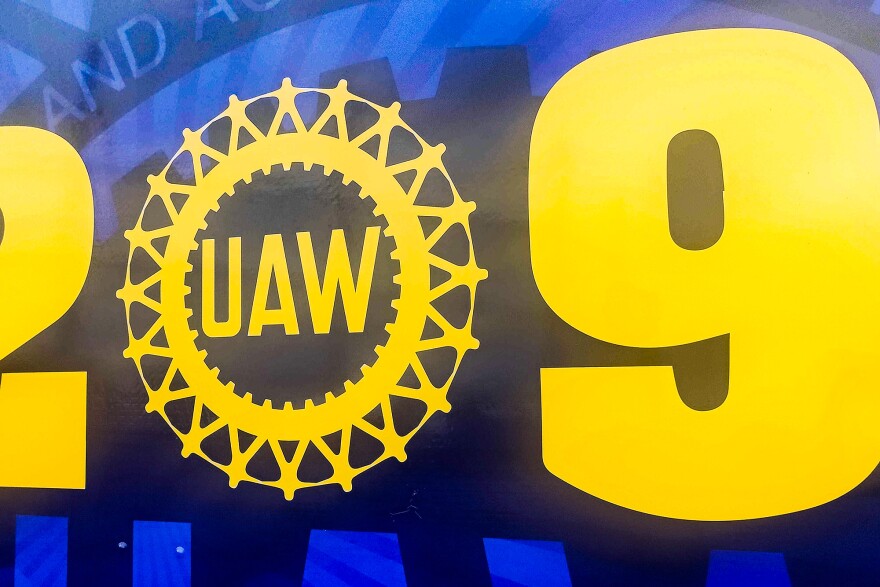 A UAW sign with its logo