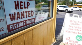 help wanted sign in a restaurant window 