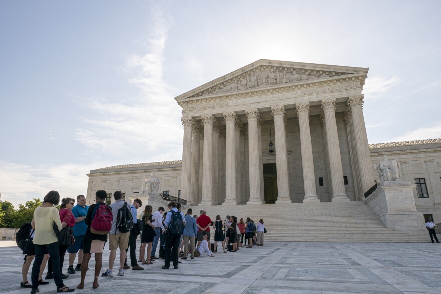 Visitors lined up at the Supreme Court in Washington, D.C., on Monday morning as the justices prepared to hand down decisions.