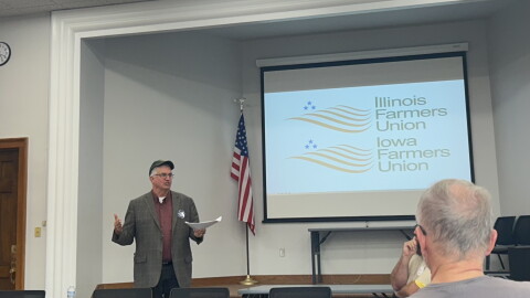 Iowa Farmers Union President Aaron Lehman speaks to union members at the Rock Island Public Library.